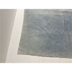 Early 20th century Welsh whole cloth sky blue quilt, in traditional quilting patterns, supported on yellow coloured backing, 174cm x 204cm
