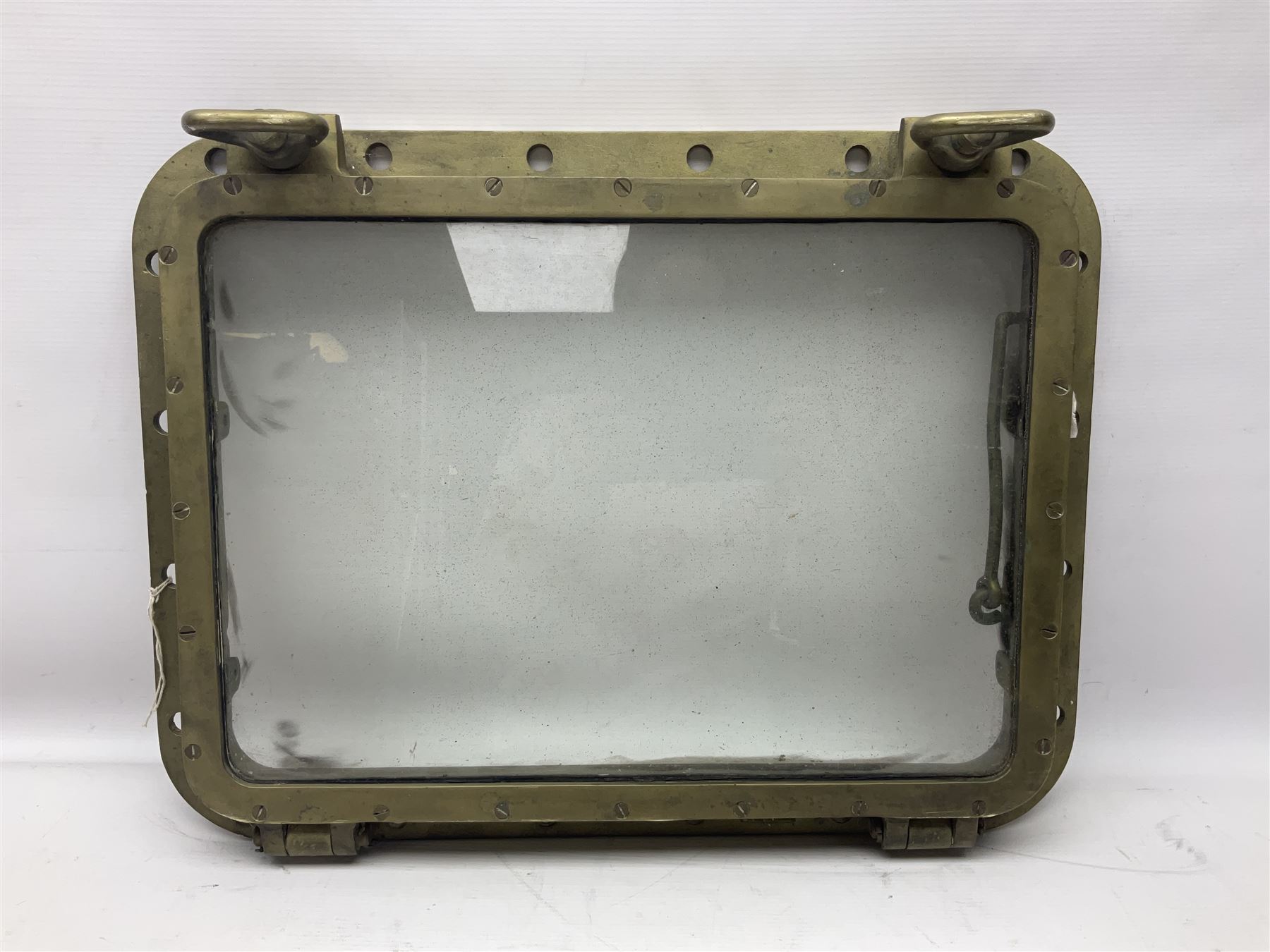 Rectangular brass porthole with hinged window, H46cm, L66cm