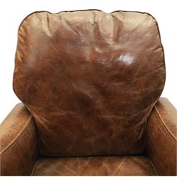 Art Deco style brown leather reclining armchair, scrolled arms with brass studded trim, reclining foot rest and back, fixed back and loose seat cushion,
