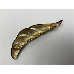 Christian Dior costume jewellery, comprising pair of pearlescent clip on earrings, enamel and paste leaf brooch and a pierced stylised leaf brooch, each stamped Chr.Dior Germany and in original boxes