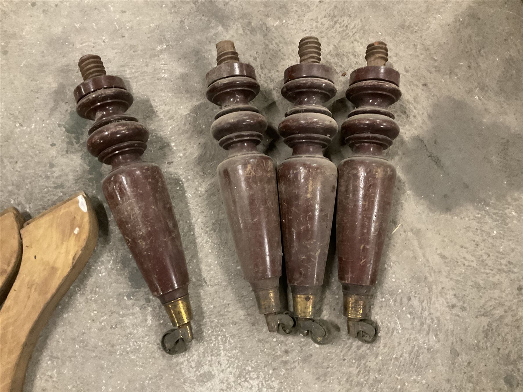 Set of four turned mahogany supports with brass cups and castors (H51cm); collection of splayed supports and turned supports; pine table and and two supports; and fifteen turned pine staircase spindles (H84cm) - THIS LOT IS TO BE COLLECTED BY APPOINTMENT FROM THE OLD BUFFER DEPOT, MELBOURNE PLACE, SOWERBY, THIRSK, YO7 1QY