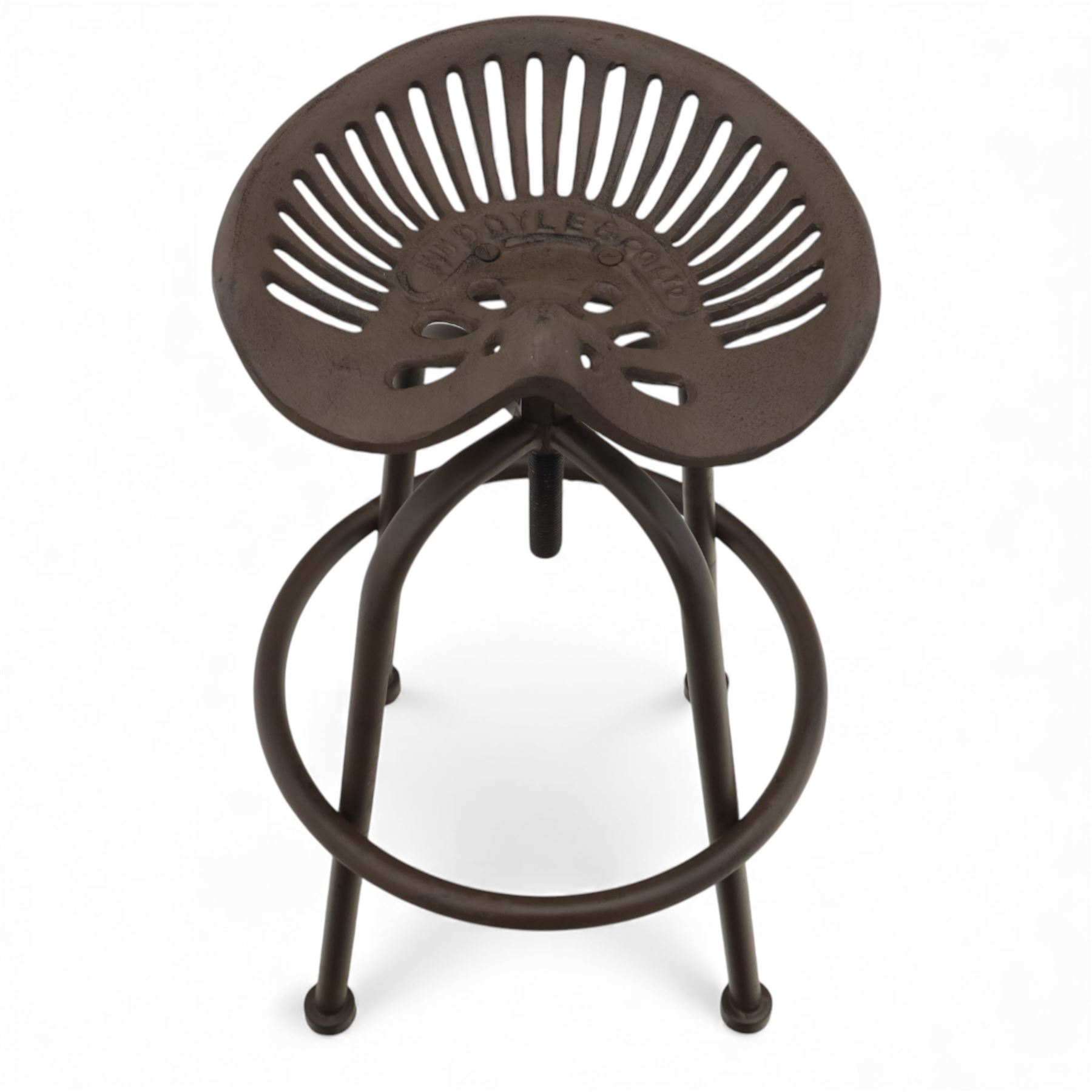 Industrial design pair of cast metal 'tractor seat' revolving bar stools, each with pierced tractor seat shaped top from the early 20th century, raised upon tubular steel supports with circular footrests (Height adjustable from 77cm - 93cm)
