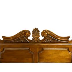 Georgian design mahogany 5' King-size four-poster bed, projecting moulded canopy top on twist-turned columns carved with acanthus leaves and flower heads, the headboard with scrolled broken swan neck pediment carved with scrolled foliage and with central anthemion, on flower head carved ball and claw front feet, with torch and foliate carved pointed finials