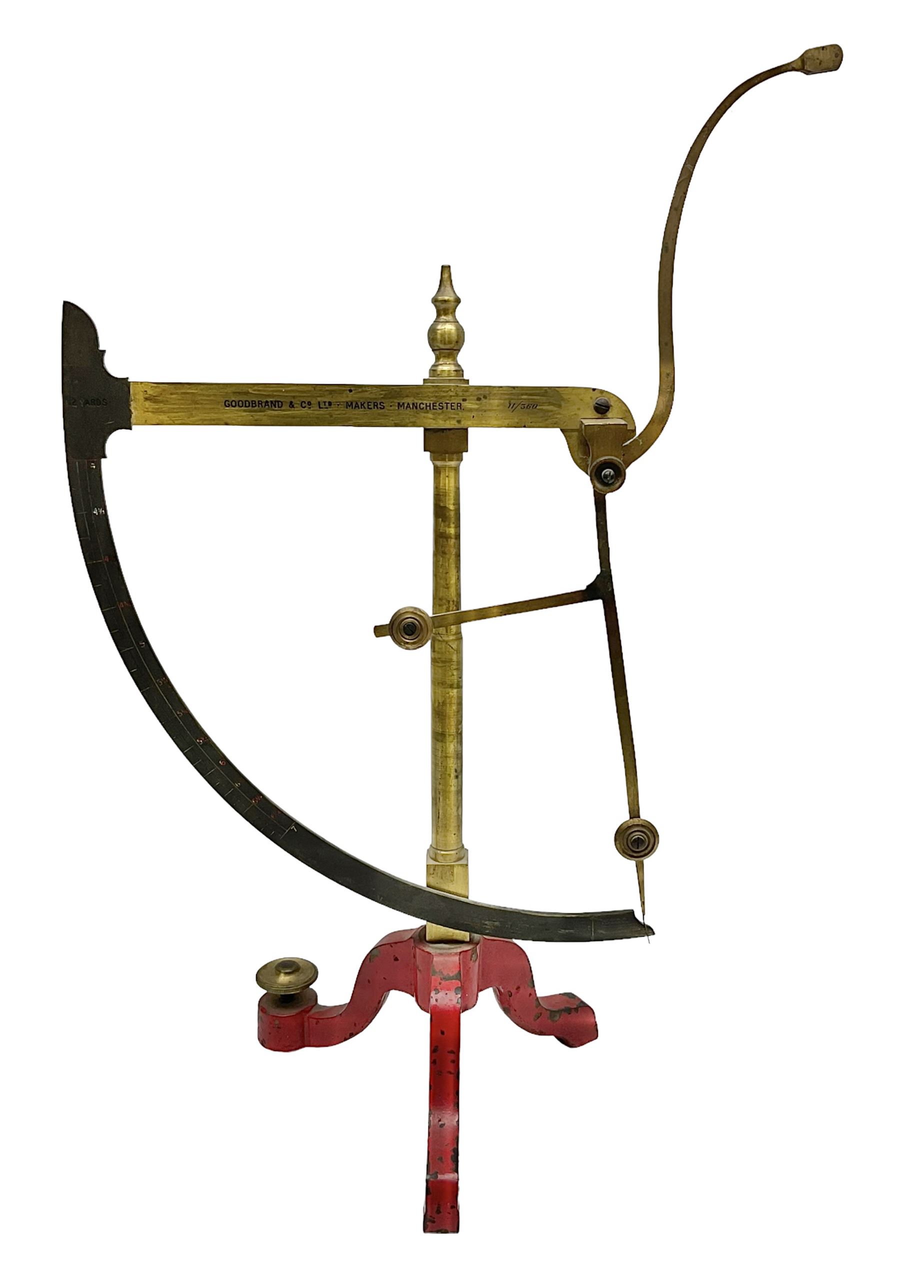Victorian brass yarn scale by Goodbrand & Co, Manchester on cast iron tri-form base, H56cm