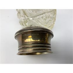 Hallmarked silver top dressing table jars, to include cut glass hobnail example with foliate engraved lid, another 20th century cut glass example with silver engraved screw thread lid, stamped H.S.M Herbert Scott Murdoch, with interior stopper and two smaller glass jars (4)