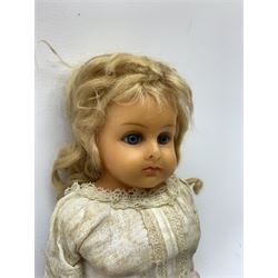 Early 20th century Cuno and Otto Dressel wax shoulder head doll with applied hair and fixed glass eyes, soft body with jointed composition lower limbs, maker's stamp to right thigh, clothing and box H38cm in original box
