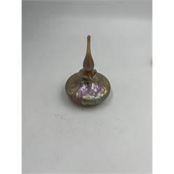 Three Okra scent bottles, each decorated with iridescent patterns on a pink ground, including perfume apple, all with original boxes, from Richard P Golding Studio 