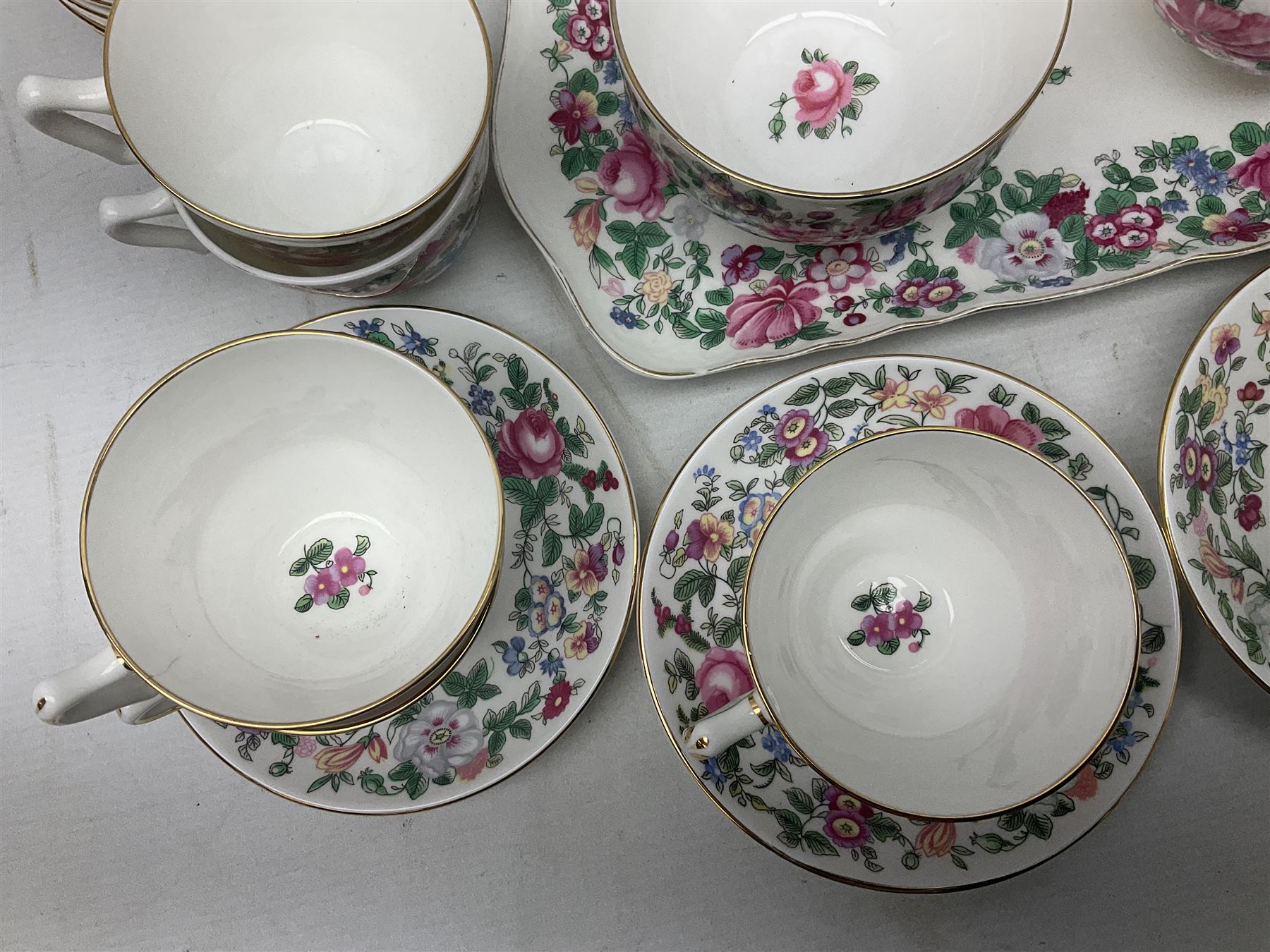 Crown Staffordshire Thousand Flowers pattern part tea service, to include teapot, two open sucriers, eighteen cups, fifteen saucers etc (57)