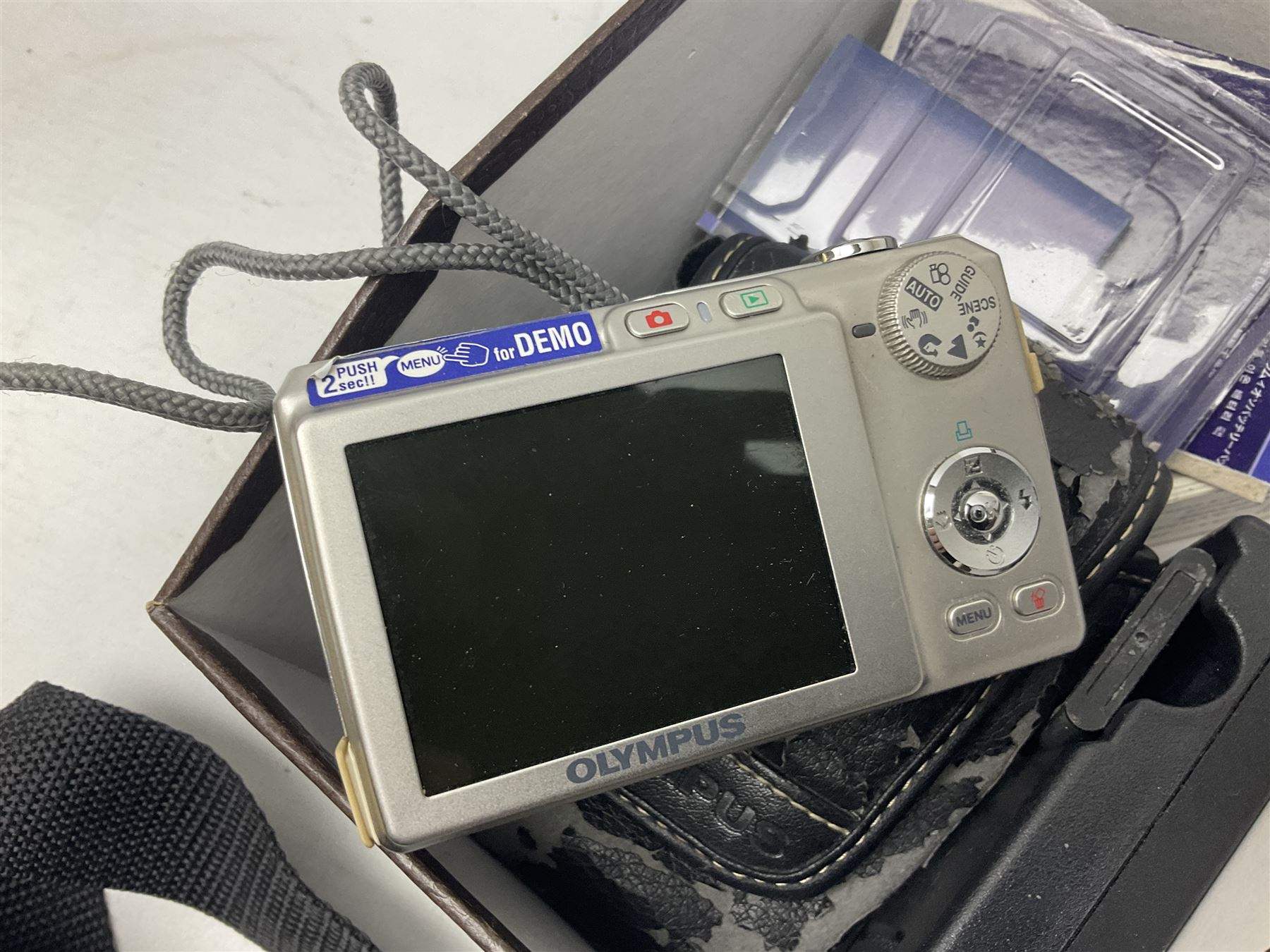 Quantity of camera accessories and equipment, to include boxed Canon EFS 17-55mm IS lens, Canon 59s camera, Olympus camera, etc