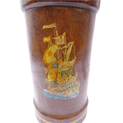  Early 20th century leather shell case with Galleon decoration, converted to stick stand, H45cm   