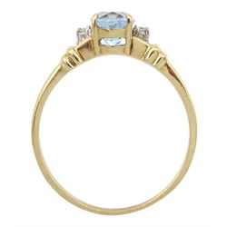 9ct gold three stone oval blue topaz and diamond ring