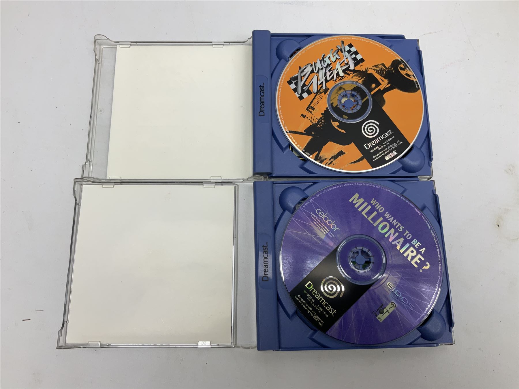 Dreamcast console, one controller, original instruction booklet with magazine and four games, ‘Aerowings’, ‘Buggy Heat’, ‘ Racing Simulation Monaco Grand Prix’ and ‘Who Wants to be a Millionaire’, all in original cases with instruction booklets 