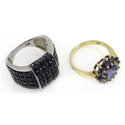 Amethyst silver gilt ring and a black stone silver buckle ring both stamped 925