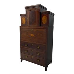 Early to mid-19th century figured mahogany Continental secrétaire à abattant, stepped top fitted with single cupboard, inlaid with oval figured amboyna panels, the fall front inlaid with shell motif enclosing a satinwood interior fitted with cupboard, drawers, and pigeon holes, three long drawers below, on square tapering feet