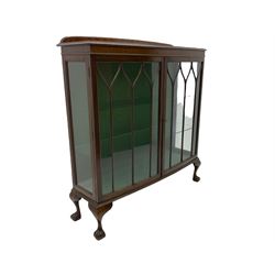  Early 20th century mahogany bow front display cabinet, ball and claw feet, glass shelves