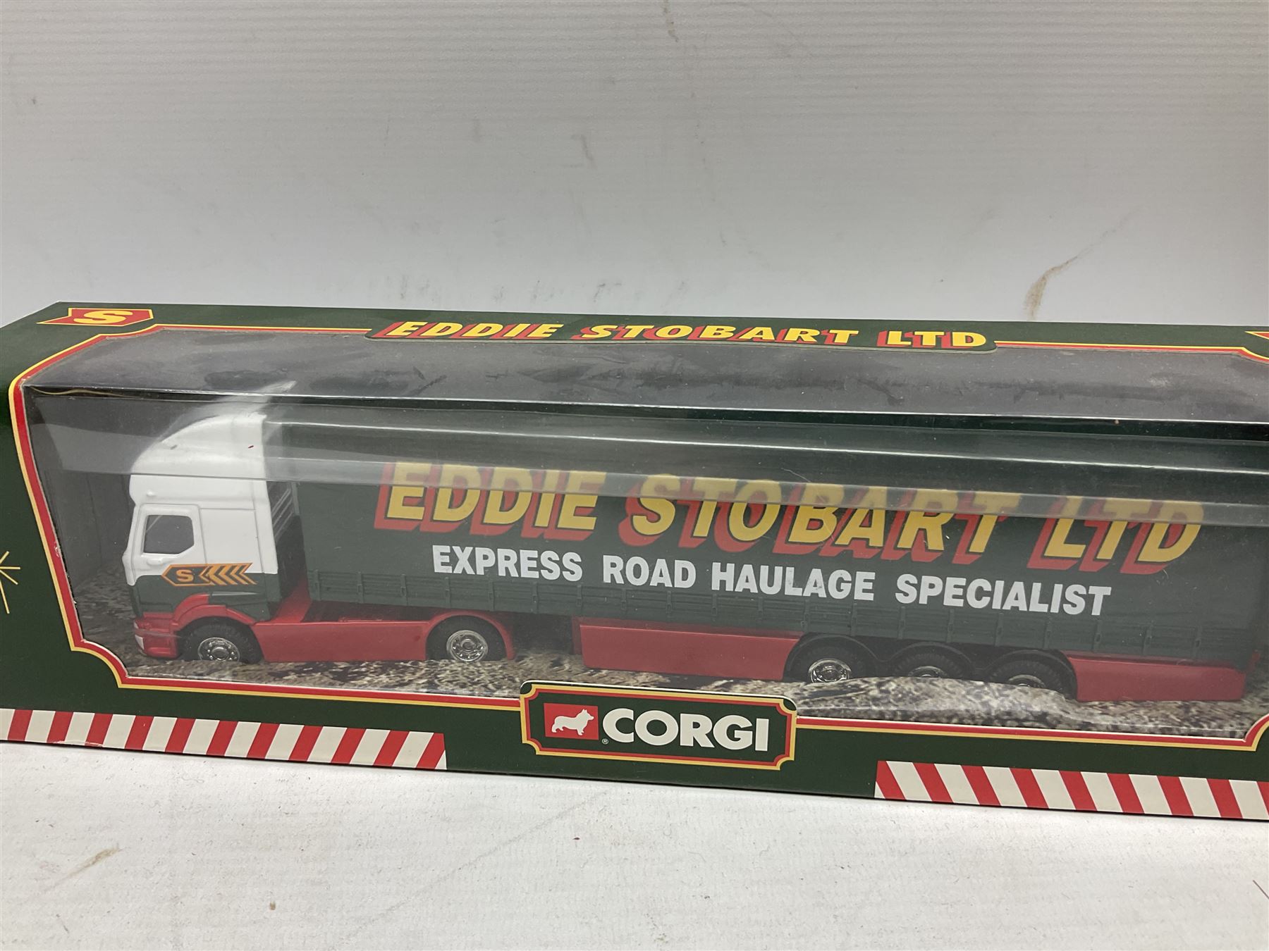 Eddie Stobart - three Corgi die-cast lorries comprising Volvo Short Wheelbase Lorry with Close Couple Trailer; 59516, Renault Curtainside Trailer; 59538 and ERF Curtainside Trailer; 59502, Oxford 1:76 scale die-cast Scania EVO 6 Car Transporter, togther with various Atlas models, all boxed (10)