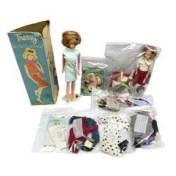 1960s Palitoy Tressy fashion doll, boxed with stand and booklets; four additional Tressy outfits (In The Office, Winter Journey, Winter Sports and Evening Date); two other outfits; and Tressy's Little Sister Toots doll with Style Book and additional outfit