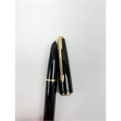 A Parker 51 fountain pen, with black body and rolled gold cap, in Parker 51 case, together with another Parker fountain pen, in maker's box, and a Parker Rialto fountain pen. (3). 