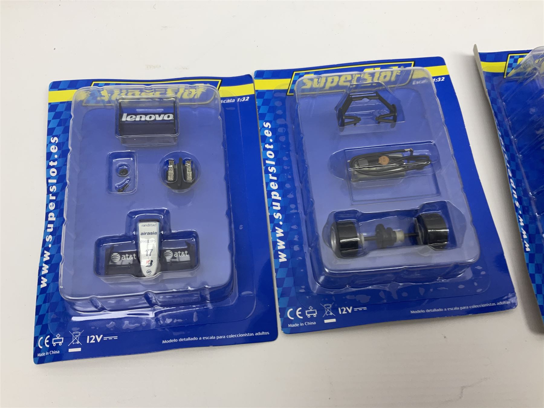 Scalextric - Scalextric 400 C587 set with March Ford 721 and JPS Formula One cars; Calibra Cup set with Motorsport Calibra and Old Spice Calibra; C8040 Track Extension Pack, Hump Back Bridge part-set and unassociated SuperSlot 1:32 scale die-cast Williams-Toyota FW29 unassembled car in four blister packs 