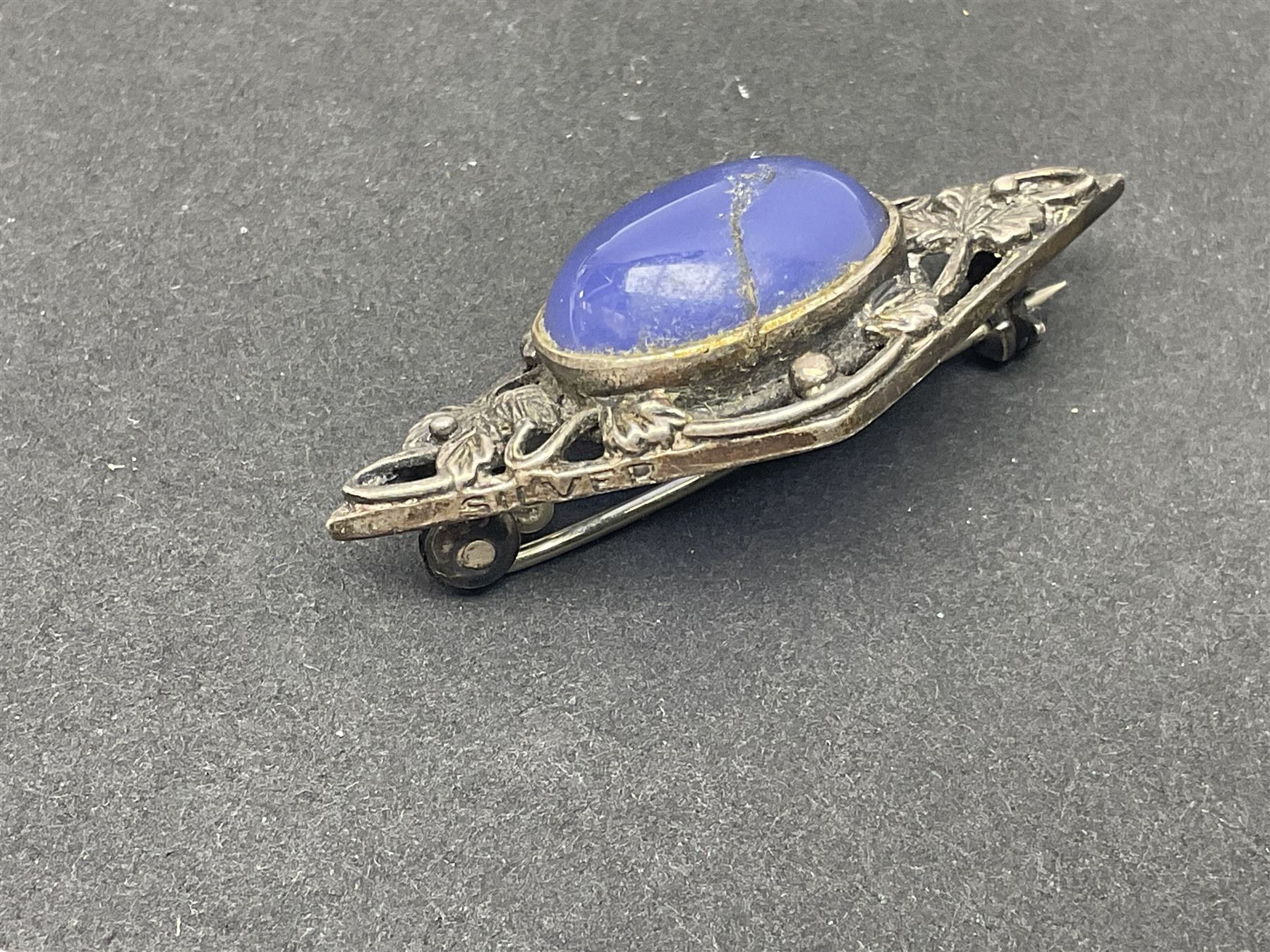 9ct gold jewellery including leaf brooch, wishbone Mizpah brooch, carnelian brooch, gold cased ladies Omega wristwatch, on leather strap and gold cased ladies Tissot wristwatch on expanding gilt strap, together with silver brooches and a Czech paste buckle, etc