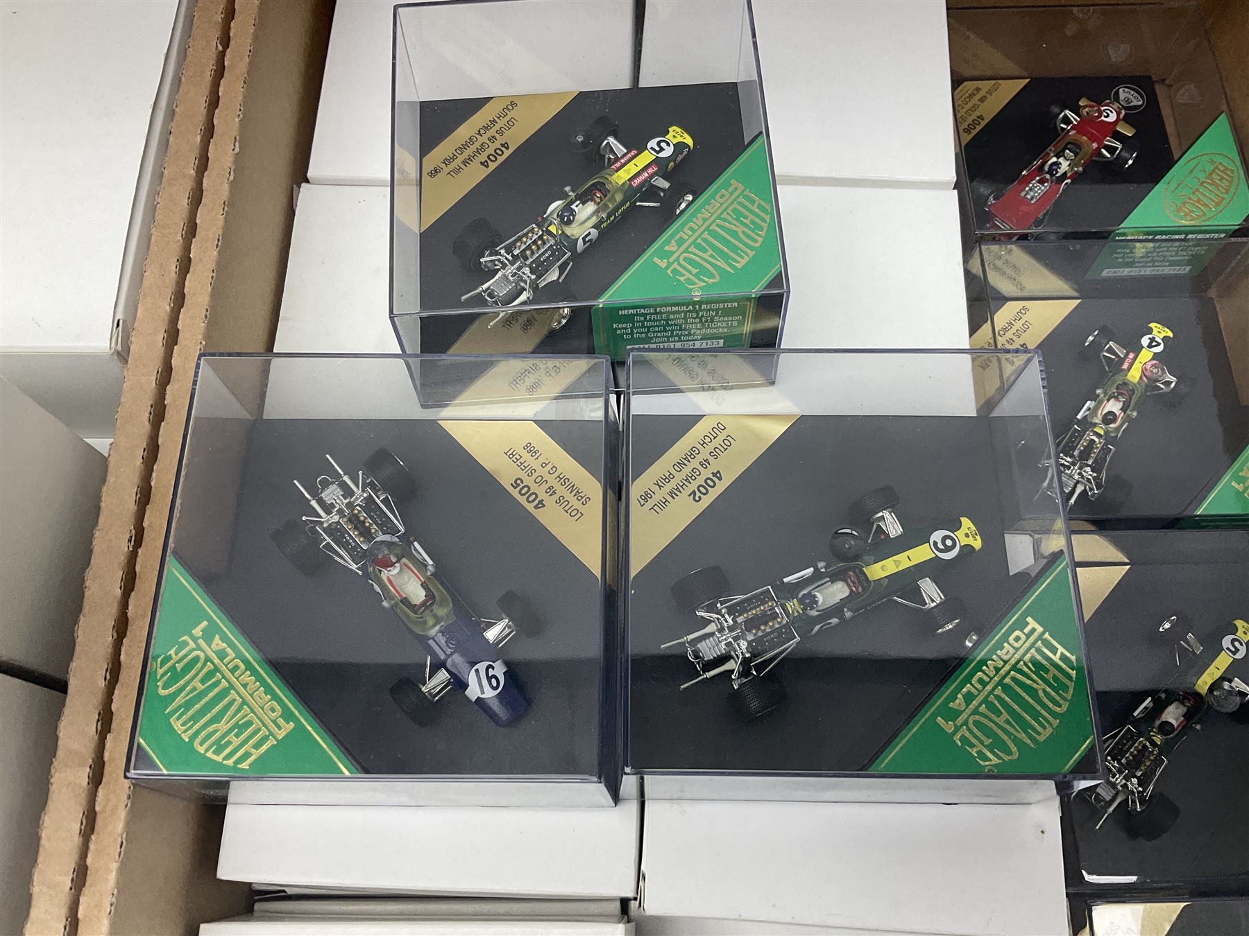 Heritage - thirty-five die-cast model racing cars comprising twenty-five Heritage Formula 1 1:43 scale models including Ferrari, Lotus, Yamaha etc; and ten Special Edition models including Williams Renault Ayrton Senna, David Coulthard and IndyCar, etc with certificates; and a Heritage Classics Damon Hill helmet; all in display boxes, many with original packaging (36)