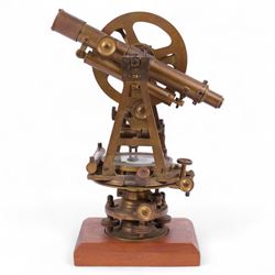 19th Century brass transit theodolite by Troughton & Simms, the sighting telescope with rack and pinion focusing above an inset compass, upon four levelling feet and a rectangular wooden base, including base H35.5cm