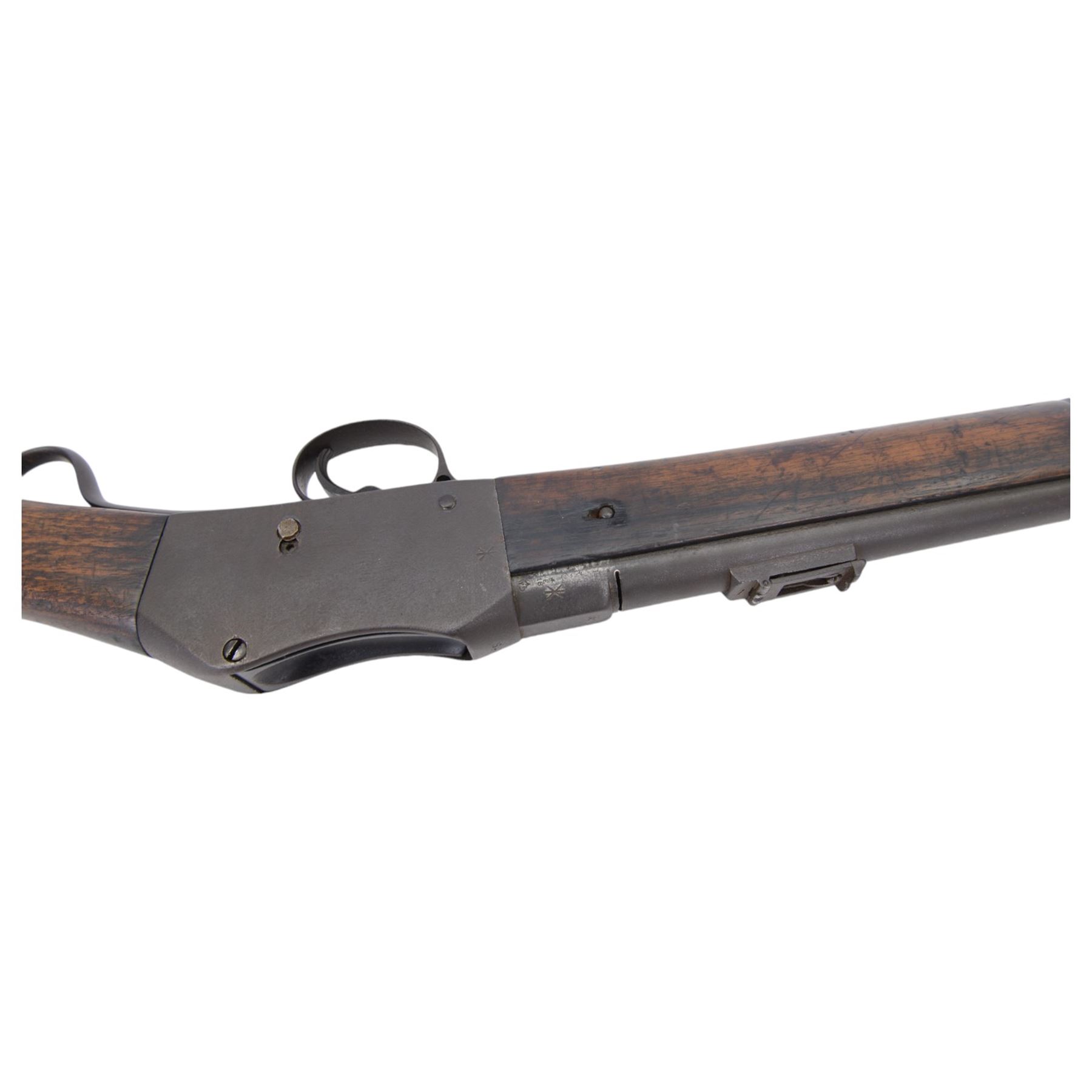 Martini-Henry MKII/2 Carbine, the 52cm round barrel with various inspectors marks,   fitted with ladder sight, with various inspector's marks, the action marked Enfield, the walnut full stock with two steel barrel bands, the butt inset with brass roundel stamped' 12 1893 V 1 GR. A 6', and with Sold Out of Service arrows to the butt, action and barrel, steel cleaning rod beneath, overall 96cm
Sold as an exempt item under Section 58 (2) of the 1968 Firearms Act, to be held as a curiosity or ornament


