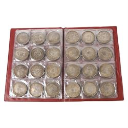 Seventy-two restrike Chinese coins, in a red album