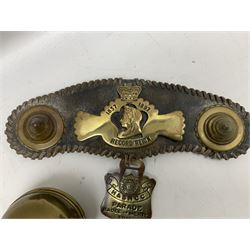 Victorian Queen Victoria record reign horse brass and H&SNCC Parade Badge of Merit 1911 horse brass, both on leather strap, together with 1924 British Empire Exhibition brass Lipton's souvenir tea caddy, strap L36cm