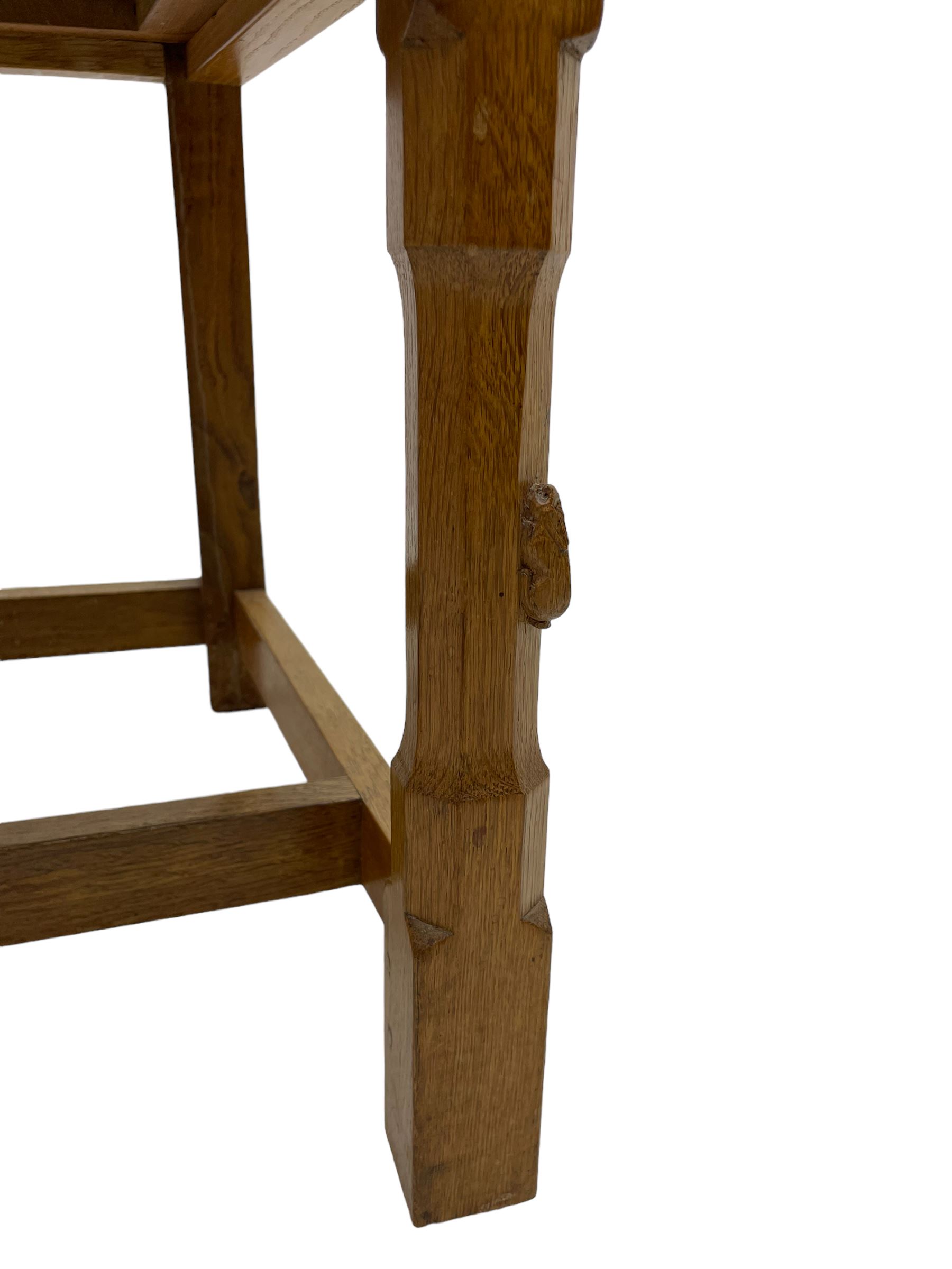 Rabbitman - set of six (4+2) oak dining chairs, carved and pierced lattice back, tan leather upholstered seat with stud band, on octagonal supports united by H-stretchers, carved with rabbit signature, by Peter Heap, Wetwang 