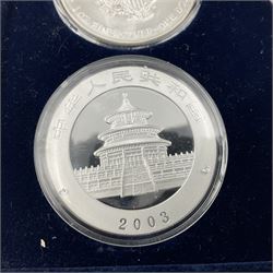 Four one ounce fine silver coins, forming 'The 2003 Famous World Silver Coin Collection', comprising United States eagle, Australian kangaroo, Chinese panda and Canadian maple leaf, cased with Westminster certificate 
