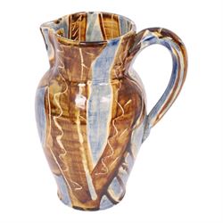 David Garland (b.1941) jug, decorated in a blue and brown glaze, with leaves and abstract patterns, H27cm
