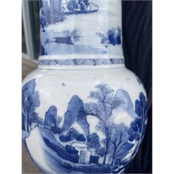 Qing Dynasty Yen Yen blue and white vase in the Kangxi style decorated with a lake landscape surrounded by rocky cliffs, figures in a boat and on the shore H45cm 