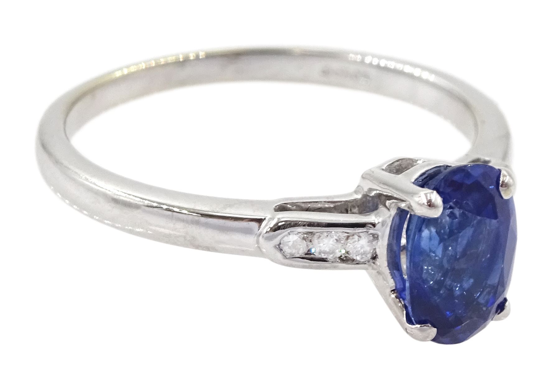 18ct white gold sapphire and diamond ring, single oval cut sapphire of approx 1.20 carat, with diamond set shoulders, hallmarked