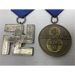 Two post-WW2 copies of German 'SS' Long Service Awards - bronze 8-year medal and silvered 12-year medal; both with ribbons (2)