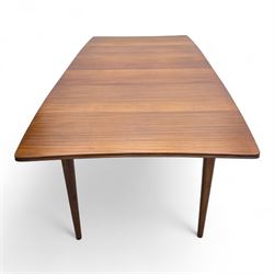 Richard Hornby for Fyne Ladye - mid-20th century afromosia teak dining table, tapered rectangular top with fluted edge and recess for spare leaf, raised on slender legs, teak framed chairs, of ladder back design, with drop-in seat, upholstered seat, with tapered front legs and slightly raked rear legs, retailed by Heals of London, table extended width 181cm depth 86cm height 74cm - chairs width 48cm depth 41cm height 87cm 