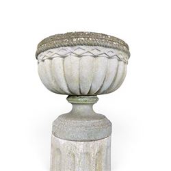 Four 20th century good quality weathered cast stone pedestal urns, circular lobed bowls with rope twist and lattice border, raised on squat base with fluted columns