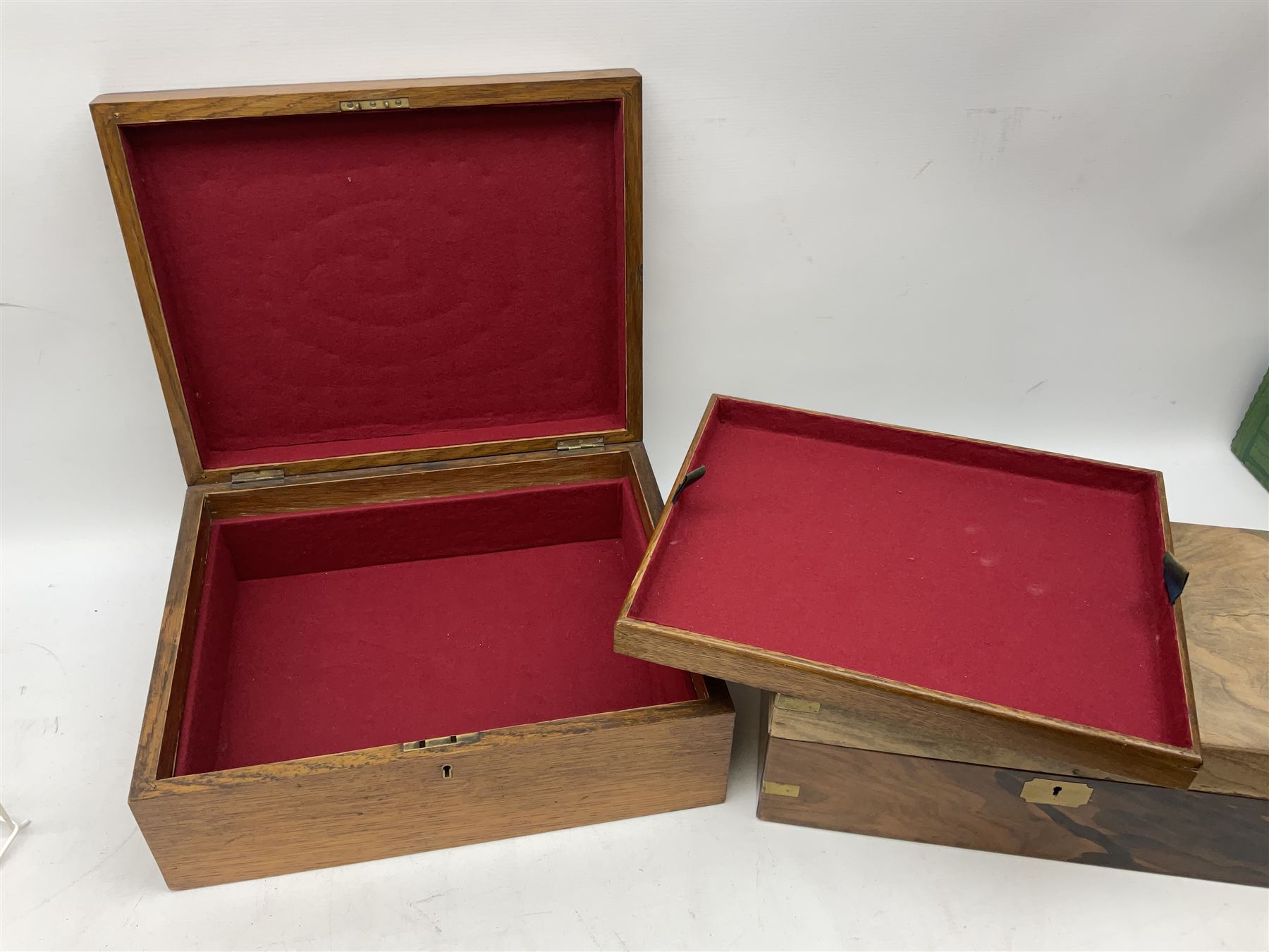 Early 20th century oak canteen box, the hinged lid decorated with marquetry banding and brass shield shaped plaque lifting to reveal red lined interior with lift out tray,  together with a walnut writing slope for restoration, largest L41cm, H44.5cm D33cm