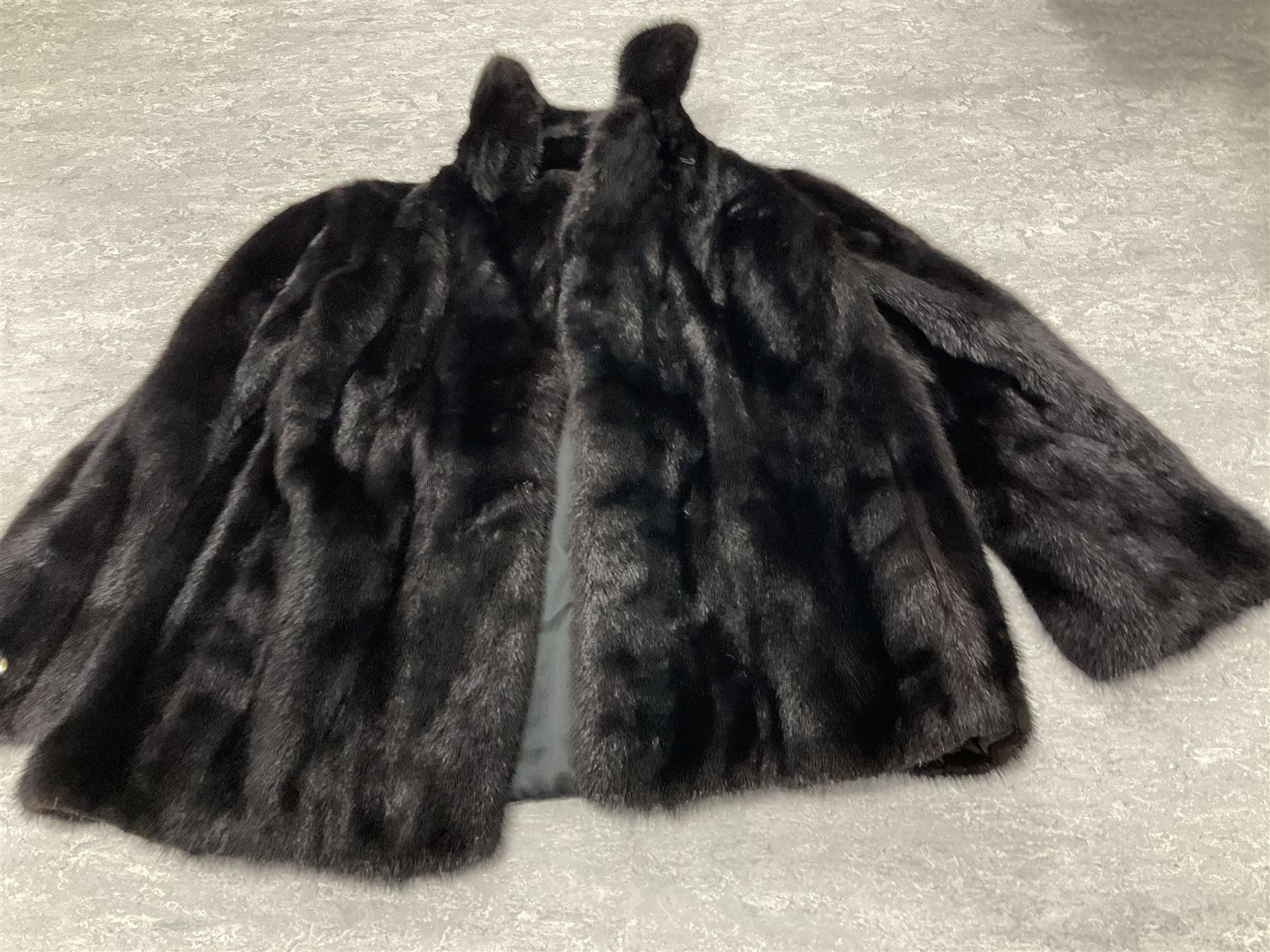 Four fur coats including two mink