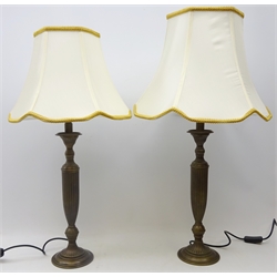  Pair classical style bronzed table lamps, fluted tapered stem on circular base, with shades, one shade slightly larger, H50cm on body (2)  