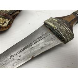 Saudi Arabian khanjar dagger with 29.5cm curving double edged  steel blade; white metal and copper mounted horn grip; in white metal mounted brass and leather scabbard incorporating embroidered leather wearing strap