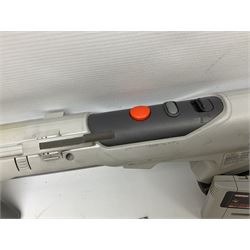 Two Super Nintendo Entertainment System (PAL) controllers, accessories and games. Super NES Game Commander with original box and instruction booklet, Super NES Nintendo Scope (1992) transmitter gun, receiver, Super NES Nintendo Scope 6 game with original instruction booklets. Further games to include ‘The Legend of Zelda a Link to the Past’, ‘Super Mario World’, ‘Super Mario Kart’, ‘The Lawnmower Man’, and ‘Exhaust Heat’, all with original instruction booklets. ‘PowerMonger’ and Disney’s ‘Aladdin’ game cartridges only 