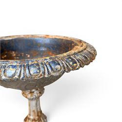 Small ornate painted 19th-century Meadow Foundry cast iron centrepiece urn, with wide, scalloped bowl rim decorated with a repeating egg and dart decoration, supported on a slender fluted pedestal with raised quatrefoil design on an octagonal plinth base  