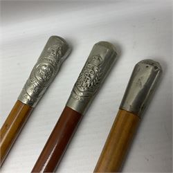 Three malacca cane swagger sticks - Duke of York's Royal military School L68cm; RAMC; and another embossed with a lion to the terminal (3)