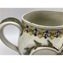 Early 19th century Prattware jug, circa 1800, decorated with two heart shaped panels of children, titled Sportive Innocence and Mischievous Sport, further decorated with acanthus and foliate borders, H22cm