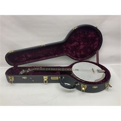 Deering seventeen-fret tenor banjo with cast metal body, serial no.H275, L79cm overall; in fitted hard carrying case