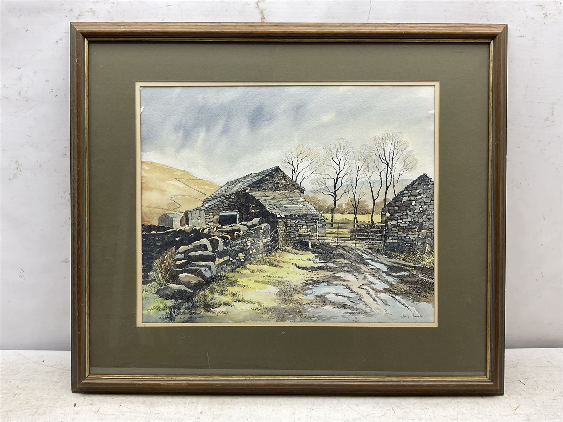 Jane Pearson (Yorkshire 20th century): 'Farm in Swaledale', watercolour and ink signed and titled 38cm x 47cm