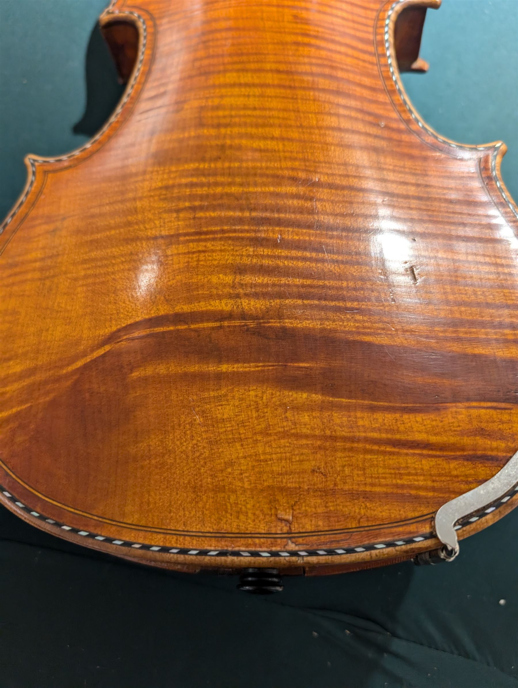 19th century full size European violin, spruce top, figured maple full back and sides, double purfling, in fitted case with two bows.