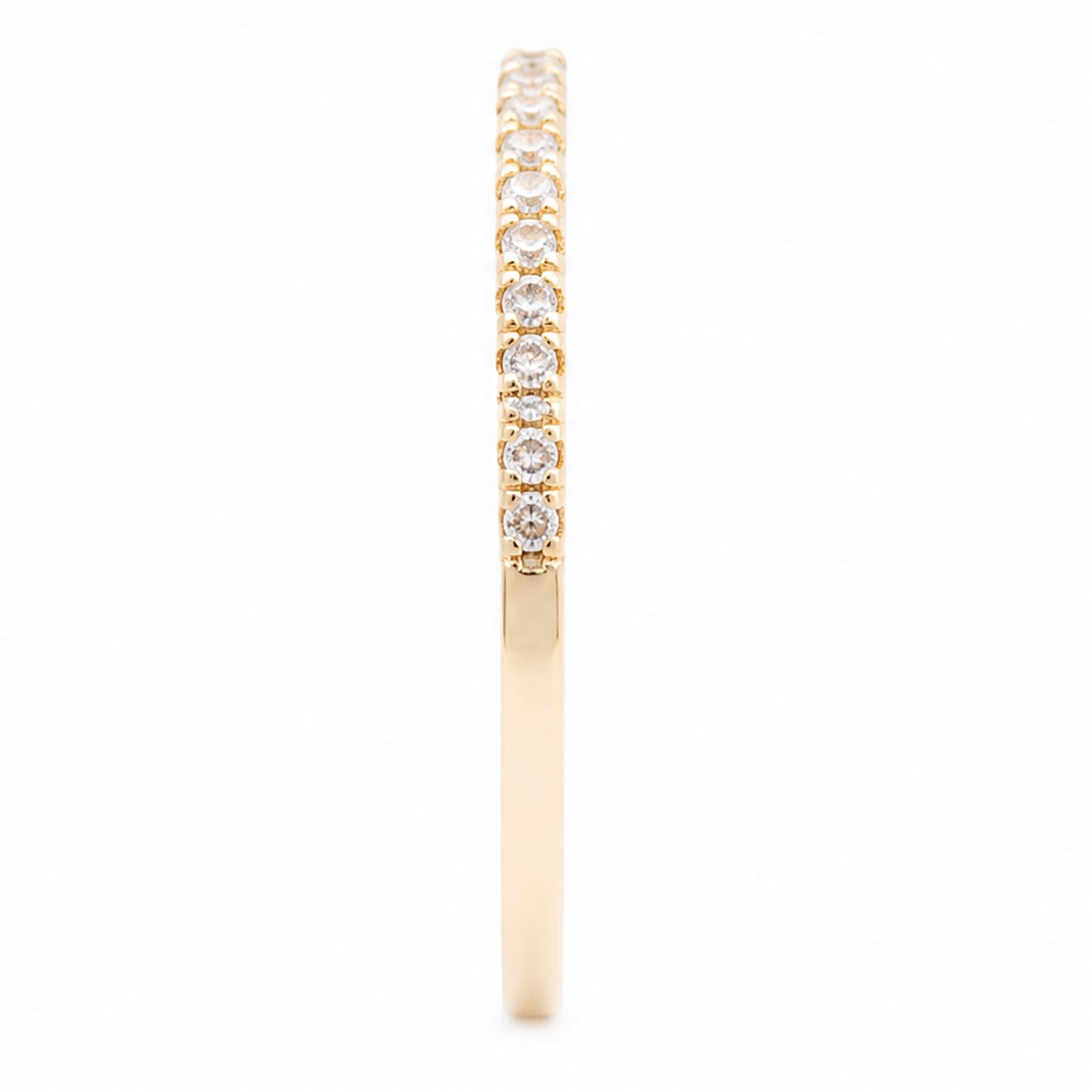 18ct gold diamond half eternity ring, set with sixteen round brilliant cut diamonds, stamped 750, total diamond weight approx 0.20 carat
