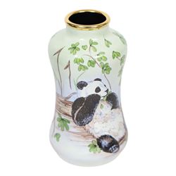 Moorcroft enamel vase, decorated with pandas, in box together with a small Moorcroft vase clematis pattern, enamel vase H8cm